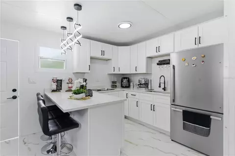 Kitchen - 8424 Balm St, Weeki Wachee, FL 34607 photo 3 of 3