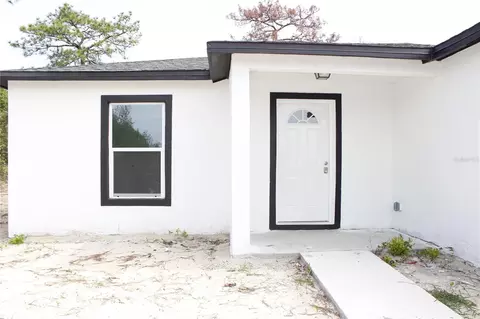 Exterior - 12493 Killian St, Spring Hill, FL 34609 photo 4 of 5