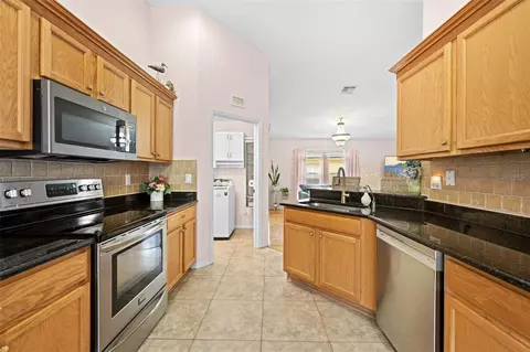 Kitchen - 11132 Heathrow Ave, Spring Hill, FL 34609 photo 4 of 6