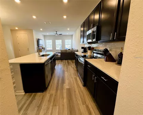 Kitchen - 390 Windy Willow Way, Saint Cloud, FL 34771 photo 2 of 5