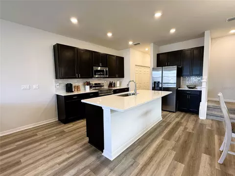 Kitchen - 390 Windy Willow Way, Saint Cloud, FL 34771 photo 3 of 5