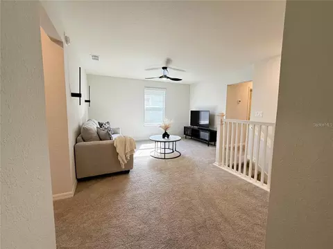 Living - 390 Windy Willow Way, Saint Cloud, FL 34771 photo 4 of 5