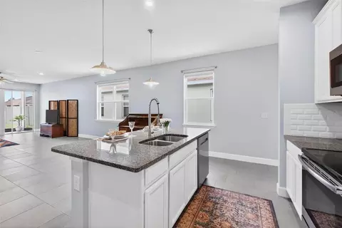 Kitchen - 10945 High Noon Trl, Parrish, FL 34219 photo 3 of 3