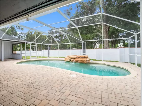 Exterior - 15901 Dover Cliffe Dr, Lutz, FL 33548 photo 5 of 13