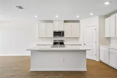 Kitchen - 13755 Umber Forest St, Hudson, FL 34669 photo 4 of 12