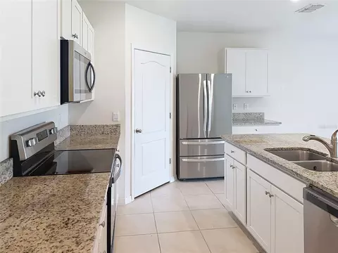 Kitchen - 533 Talisi Loop, Saint Cloud, FL 34771 photo 4 of 5