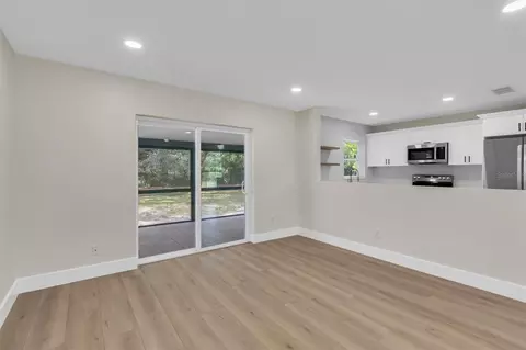 Living - 7256 Pinehurst Dr, Spring Hill, FL 34606 photo 5 of 6
