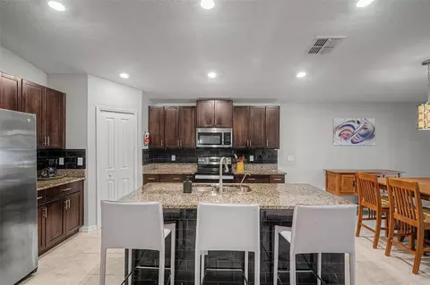 Kitchen - 13411 Willow Bluestar Loop, Riverview, FL 33579 photo 3 of 4