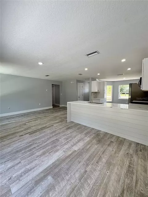 Living - 142 Rosedale Ave, Spring Hill, FL 34606 photo 3 of 7