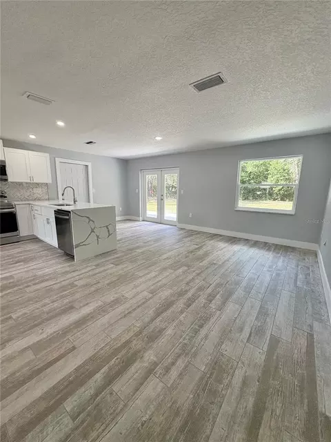 Living - 142 Rosedale Ave, Spring Hill, FL 34606 photo 2 of 7
