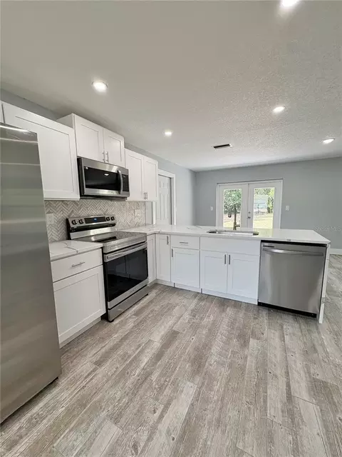 Kitchen - 142 Rosedale Ave, Spring Hill, FL 34606 photo 5 of 14