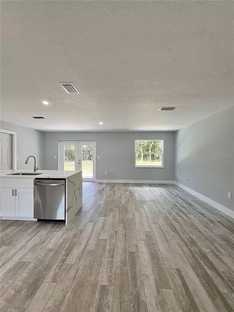Living - 142 Rosedale Ave, Spring Hill, FL 34606 photo 1 of 7
