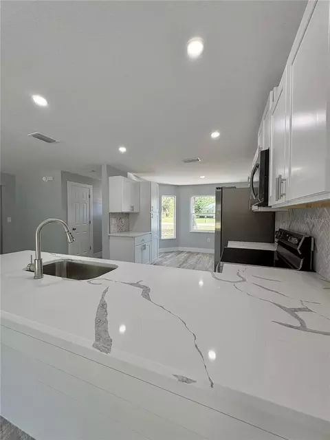 Kitchen - 142 Rosedale Ave, Spring Hill, FL 34606 photo 13 of 14