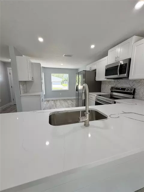 Kitchen - 142 Rosedale Ave, Spring Hill, FL 34606 photo 12 of 14
