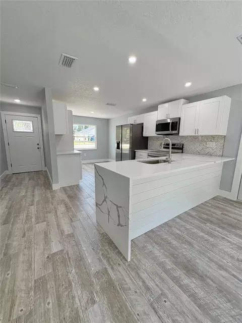 Kitchen - 142 Rosedale Ave, Spring Hill, FL 34606 photo 1 of 14
