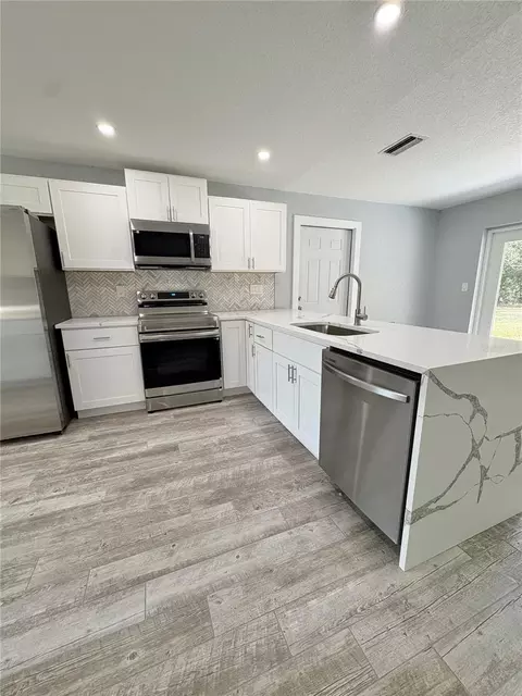 Kitchen - 142 Rosedale Ave, Spring Hill, FL 34606 photo 3 of 14