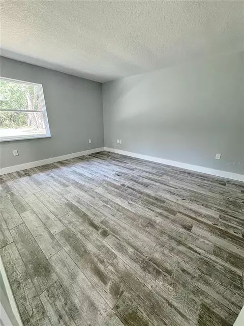 Bedroom - 142 Rosedale Ave, Spring Hill, FL 34606 photo 6 of 8