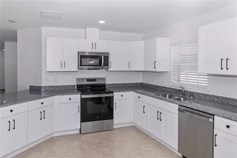 Kitchen - 906 7th St, Wimauma, FL 33598 photo 2 of 3