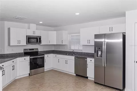 Kitchen - 906 7th St, Wimauma, FL 33598 photo 1 of 3