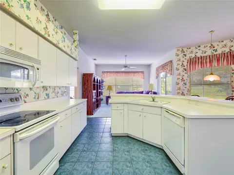 Kitchen - 11228 Windrush Cir, Hudson, FL 34667 photo 3 of 4