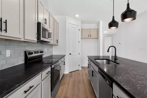 Kitchen - 1623 Cane Bamboo Dr, Saint Cloud, FL 34771 photo 2 of 3