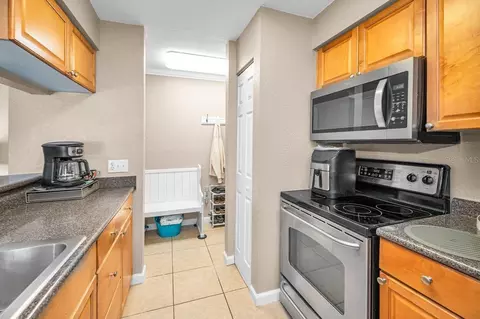Kitchen - 10195 Sailwinds Blvd N #201, Largo, FL 33773 photo 3 of 7