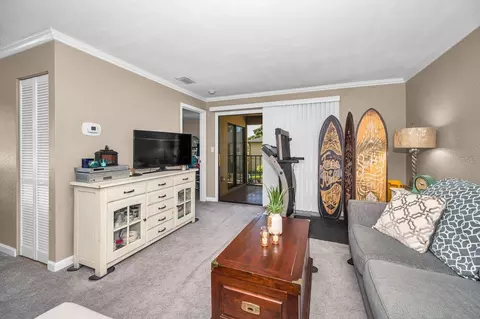 Living - 10195 Sailwinds Blvd N #201, Largo, FL 33773 photo 2 of 5