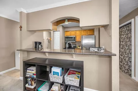 Kitchen - 10195 Sailwinds Blvd N #201, Largo, FL 33773 photo 6 of 7