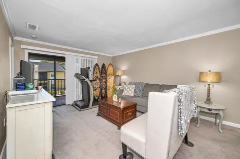 Living - 10195 Sailwinds Blvd N #201, Largo, FL 33773 photo 1 of 5