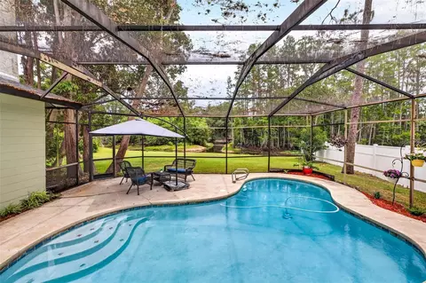 Exterior - 910 Hillside Dr, Lutz, FL 33549 photo 5 of 11