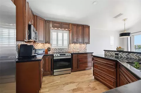Kitchen - 3420 Eagle Nest Dr, Hernando Beach, FL 34607 photo 8 of 9