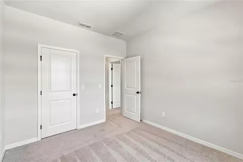 Bedroom - 5600 Coopers Hawk Ct, Saint Cloud, FL 34772 photo 4 of 4
