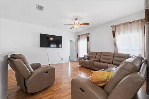 Living - 704 Parsons Pointe St, Seffner, FL 33584 photo 3 of 5