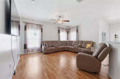 Living - 704 Parsons Pointe St, Seffner, FL 33584 photo 4 of 5