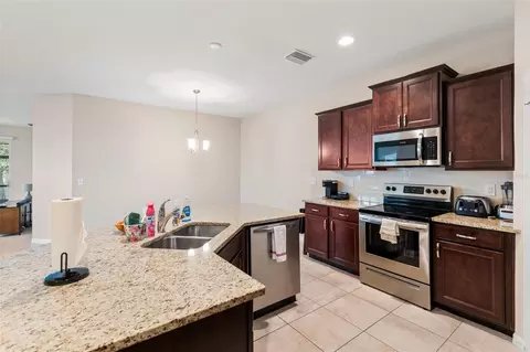 Kitchen - 7727 Timberview Loop, Wesley Chapel, FL 33545 photo 5 of 5