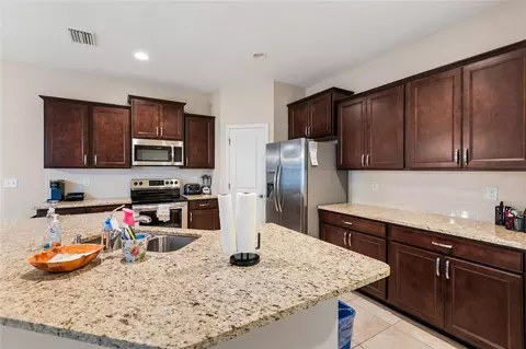 Kitchen - 7727 Timberview Loop, Wesley Chapel, FL 33545 photo 2 of 5