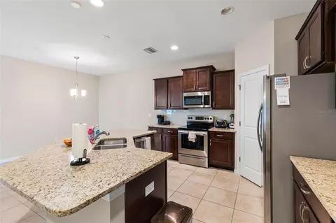 Kitchen - 7727 Timberview Loop, Wesley Chapel, FL 33545 photo 4 of 5