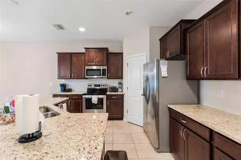 Kitchen - 7727 Timberview Loop, Wesley Chapel, FL 33545 photo 3 of 5