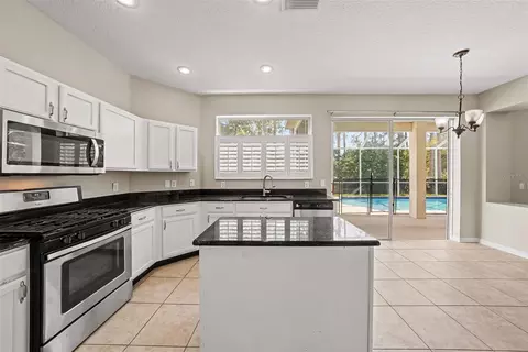 Kitchen - 6112 Cezanne Ave, Lutz, FL 33558 photo 1 of 2