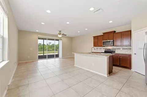 Living - 8961 Turnstone Haven Pl, Tampa, FL 33619 photo 1 of 4