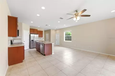 Living - 8961 Turnstone Haven Pl, Tampa, FL 33619 photo 3 of 4