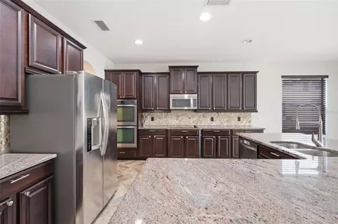 Kitchen - 1120 Maza Pl, Trinity, FL 34655 photo 4 of 9