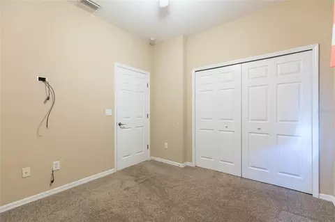 Bedroom - 18018 Java Isle Dr, Tampa, FL 33647 photo 8 of 10