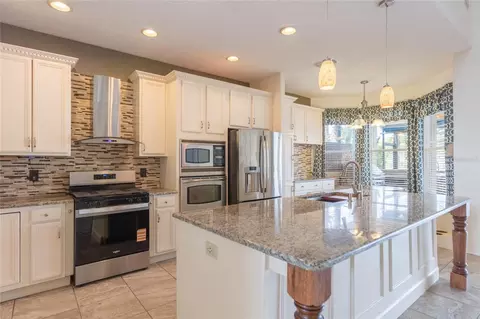 Kitchen - 18018 Java Isle Dr, Tampa, FL 33647 photo 2 of 7