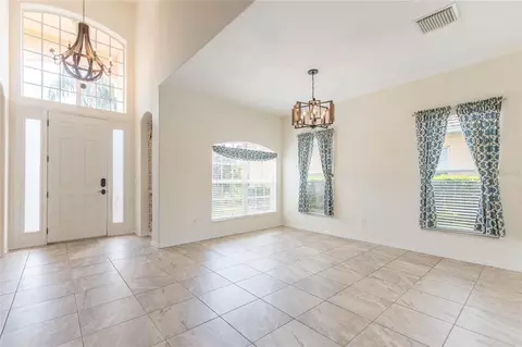 Living - 18018 Java Isle Dr, Tampa, FL 33647 photo 1 of 11