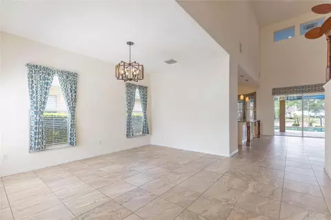 Living - 18018 Java Isle Dr, Tampa, FL 33647 photo 2 of 11