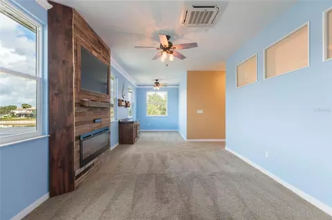 Living - 18018 Java Isle Dr, Tampa, FL 33647 photo 10 of 11
