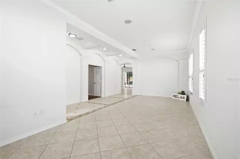 Living - 13860 Siena Loop, Bradenton, FL 34202 photo 2 of 13