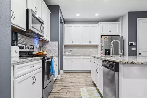 Kitchen - 1309 Sunset Wind Loop, Oldsmar, FL 34677 photo 2 of 3