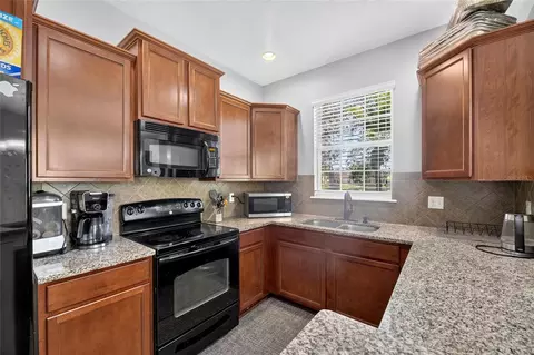 Kitchen - 8833 Moonlit Meadows Loop, Riverview, FL 33578 photo 3 of 4